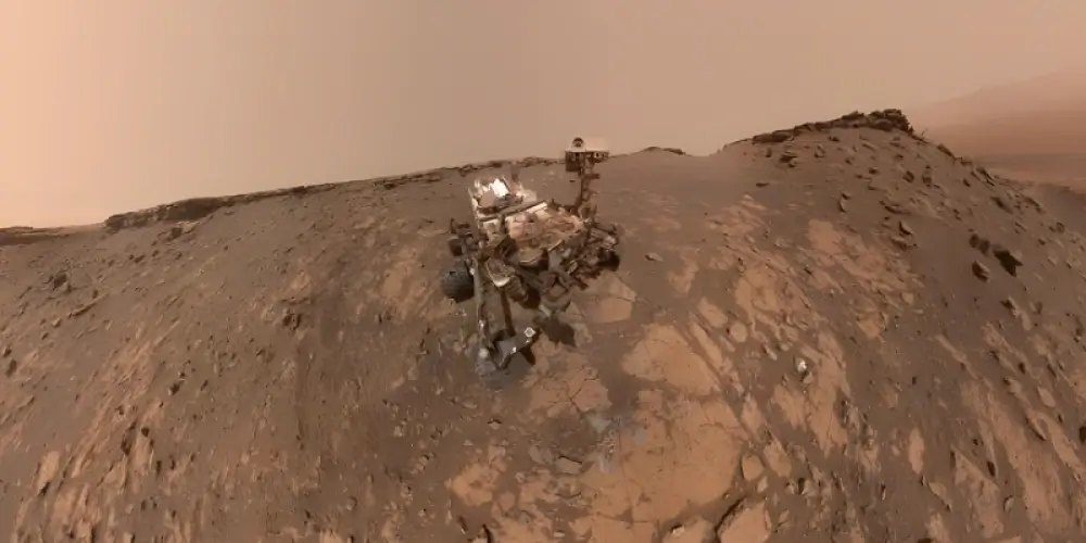 Curiosity snapped a selfie before its steepest climb, while Perseverance plans to collect Mars samples.